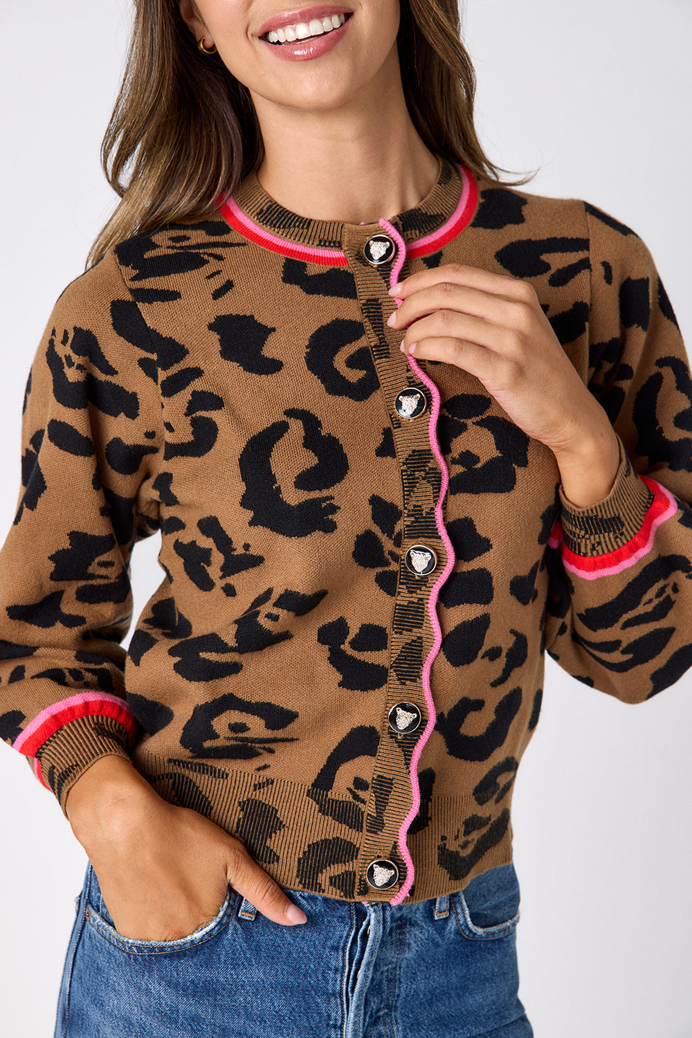 Crosby Colson Leopard Cardigan, close-up detail of collar trim, wavy placket, and leopard-face buttons