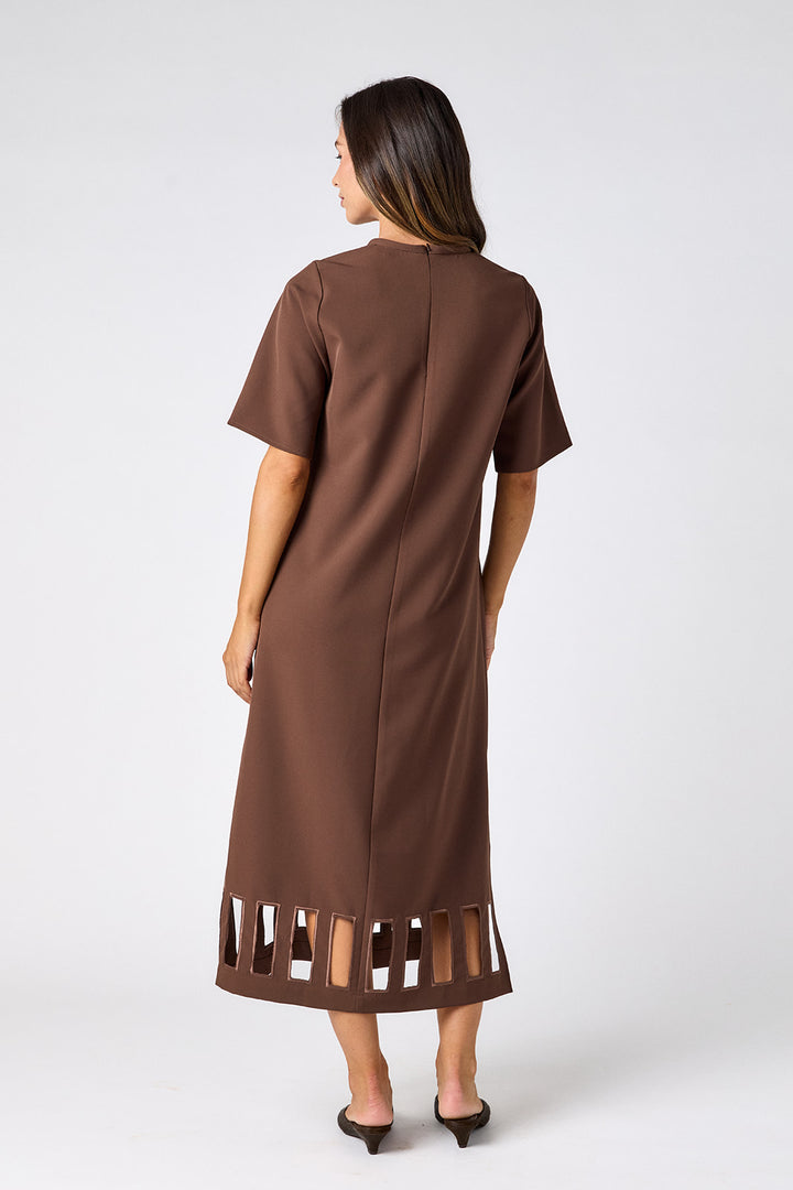 Crosby Greyson Dress in Brownie, back view on model showing center back seam, short sleeves, and rectangular cutout hem