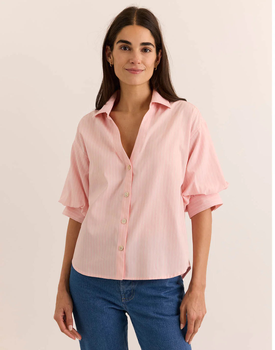 Front-facing view of the Hinson Wu Lilian Elbow Sleeve Pencil Stripe Shirt in blush pink pinstripe, highlighting the cropped, boxy silhouette and full button placket.