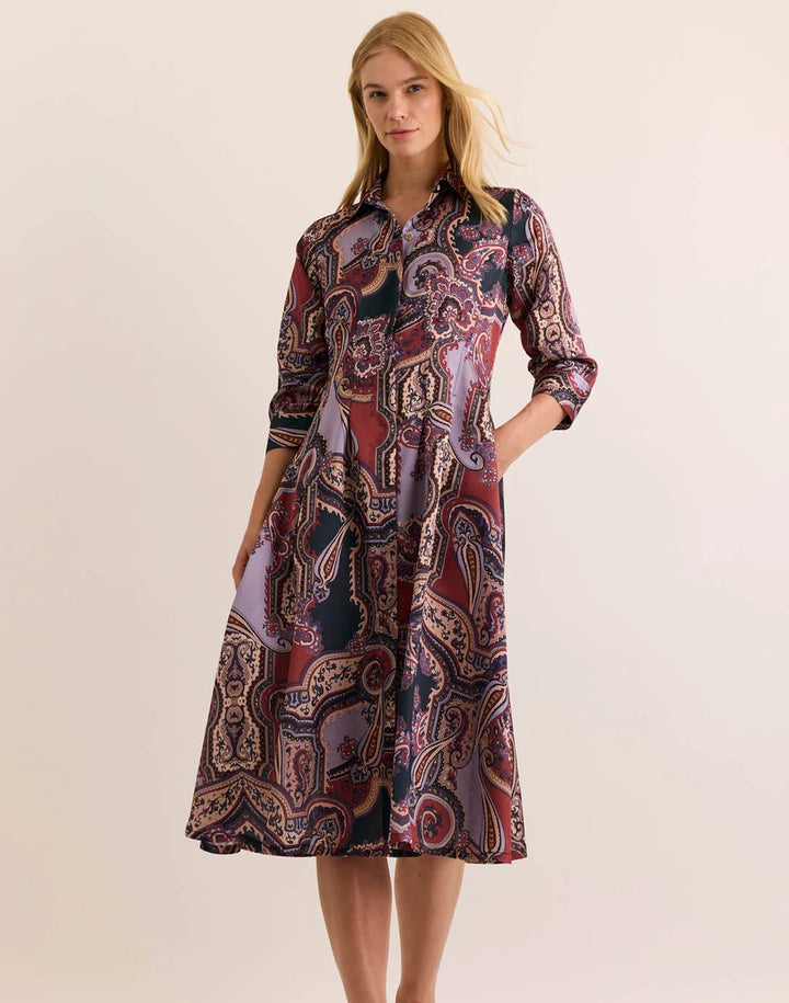 Hinson Wu Martina Plum Paisley 3/4 Sleeve Dress — front view on model, walking, hand in pocket