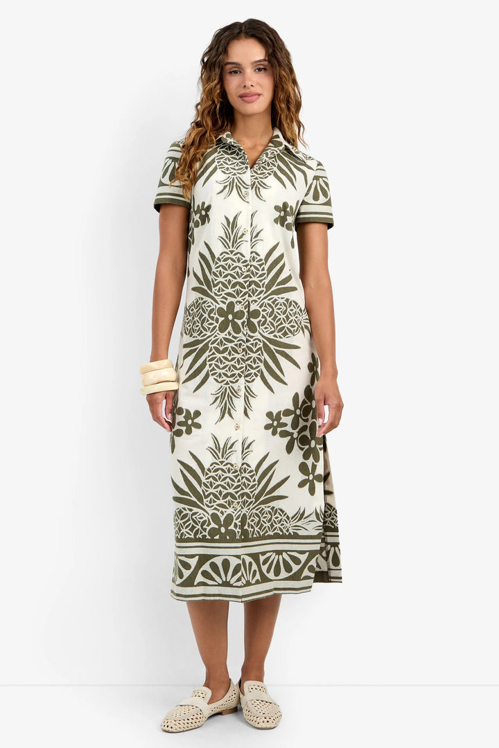 Front view of model wearing the Trina Turk Abba Midi Dress, highlighting the graphic hem border.