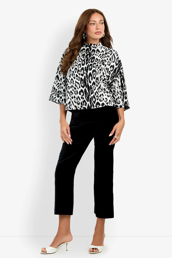 Angled front view of the Trina Turk Sidony Top showing the relaxed silhouette, monochrome leopard jacquard, and wide elbow-length sleeves.