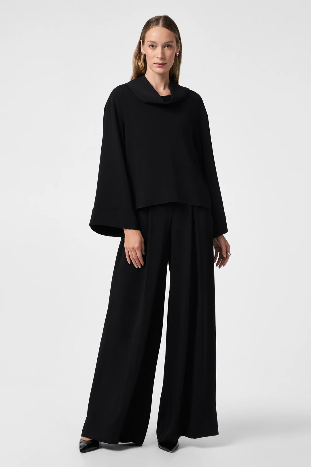 Trina Turk Saige Pant Black – full front view on model, styled with cropped high-neck top