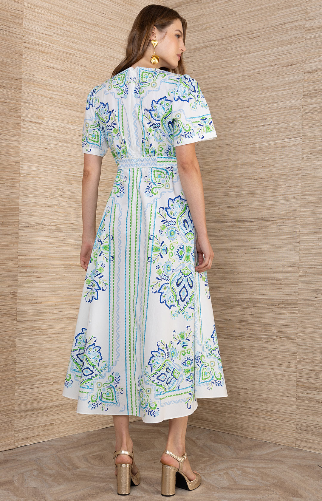 Hale Bob Mona Short Sleeve Midi Dress in Blue, back view, A-line silhouette with engineered medallion print and flutter sleeves