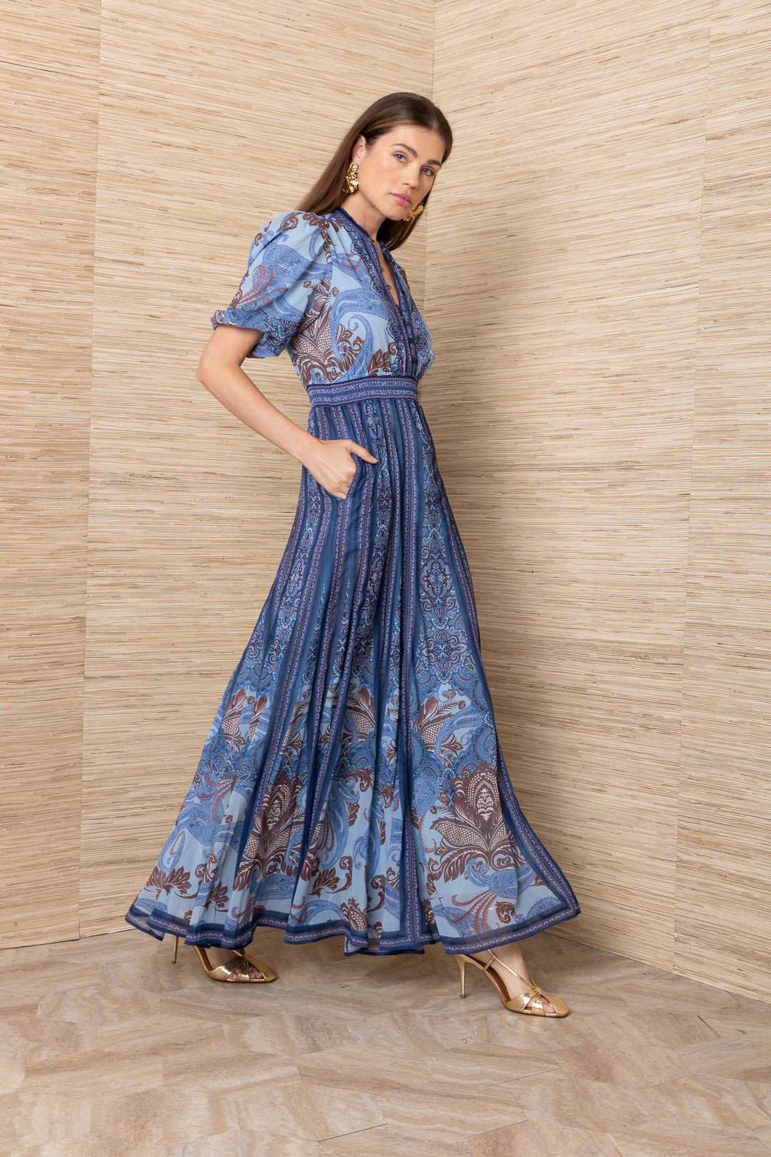 Hale Bob Liliosa Short Sleeve Maxi Dress in blue paisley print — side profile showing puff sleeve, smocked waist, and flowing skirt
