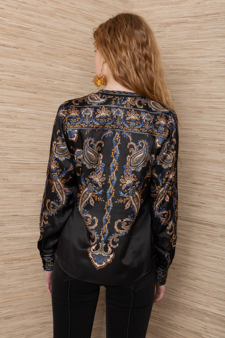 Hale Bob Beata Long Sleeve Button Down Blouse in Black Multi, back view on model, showing smocked neckline, border-printed back yoke, mirrored paisley print, and curved shirttail hem.