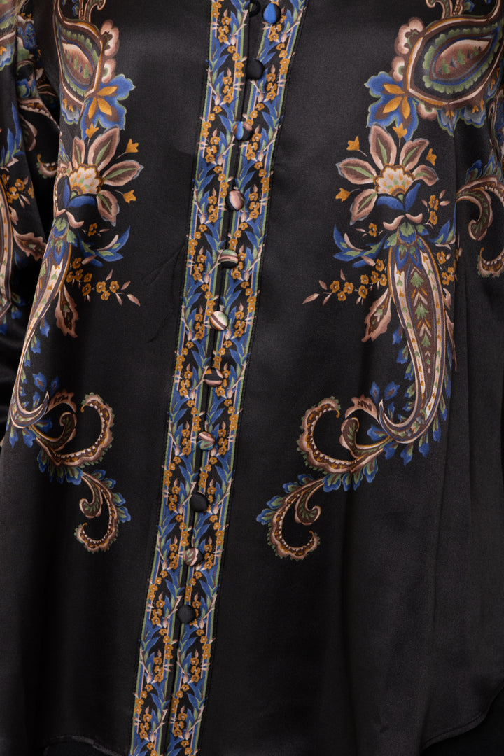 Hale Bob Beata Long Sleeve Button Down Blouse in Black Multi, close-up of the floral border-print placket with fabric-covered buttons and surrounding paisley motifs on black satin.