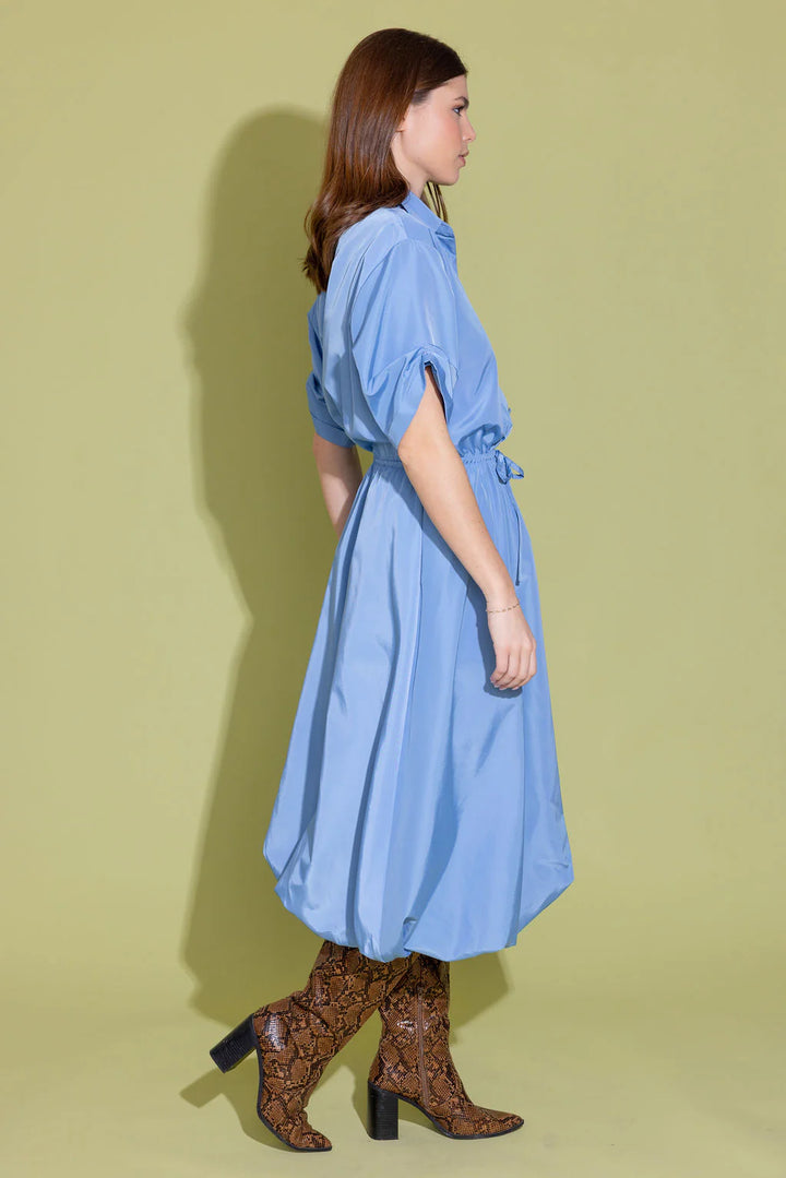Alden Adair Kyra Dress in French Blue — side profile on-model, showing bubble hem silhouette