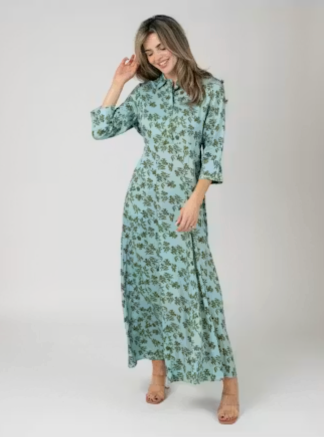 Full-length front view of the Beau &amp; Ro Alexa Dress in Blue Wiley Floral cotton, styled with rose gold heeled sandals against a neutral backdrop.