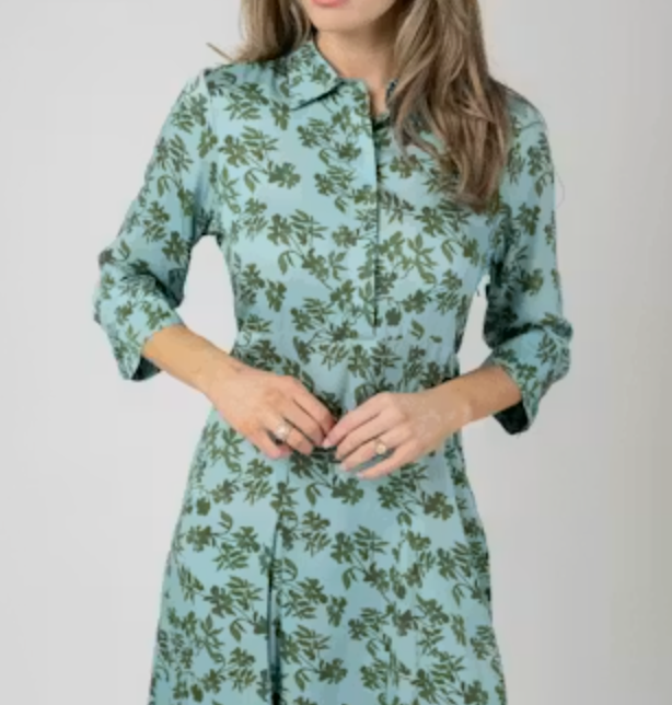 Close crop of the Beau &amp; Ro Alexa Dress showing the point collar, open placket, and olive floral detail in Blue Wiley Floral print.