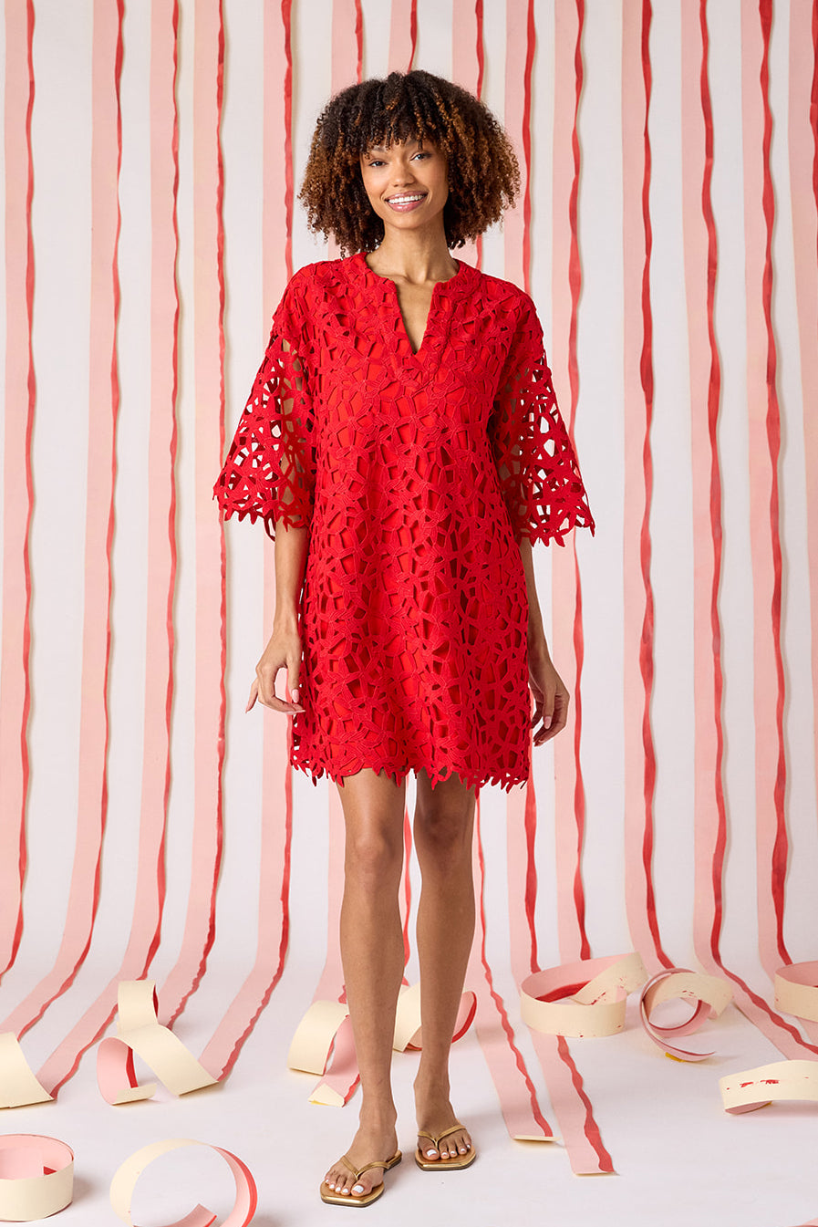 Crosby Alice Lace Tunic Dress in Pomegranate with all-over geometric crochet lace construction, V-notch neckline, three-quarter bell sleeves, and scalloped lace hem at mini length.