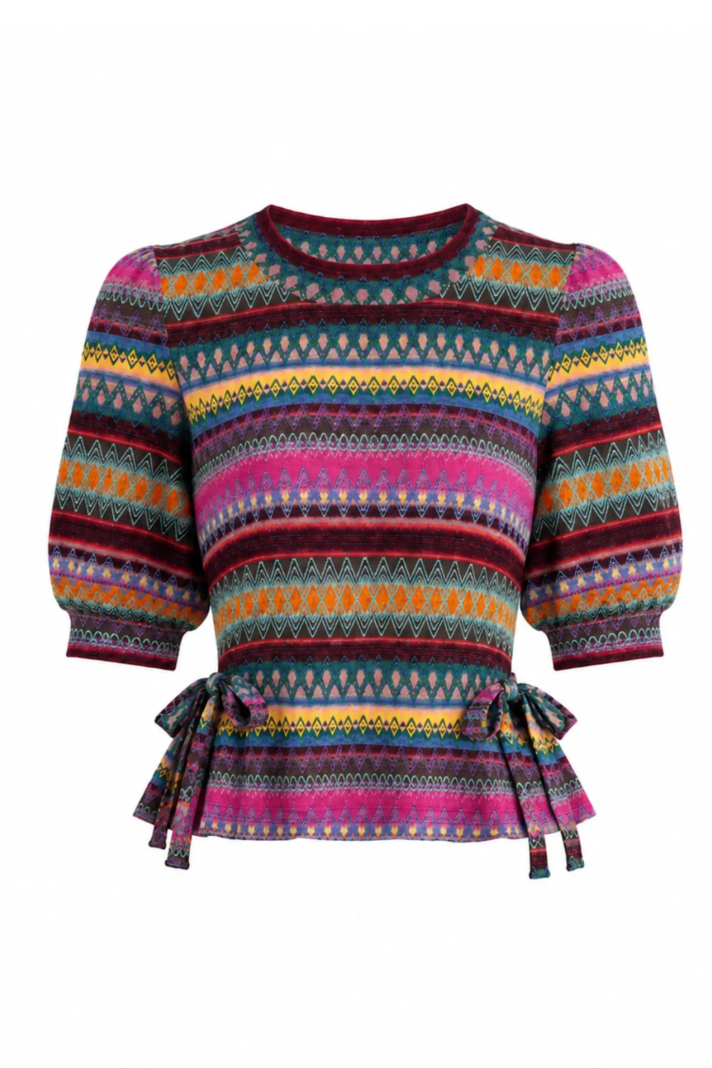 A vibrant, multicolored knit top with horizontal geometric patterns in pink, orange, yellow, blue, and red, featuring puff sleeves and a ruffled peplum hem with tie details, shown on a plain white background.