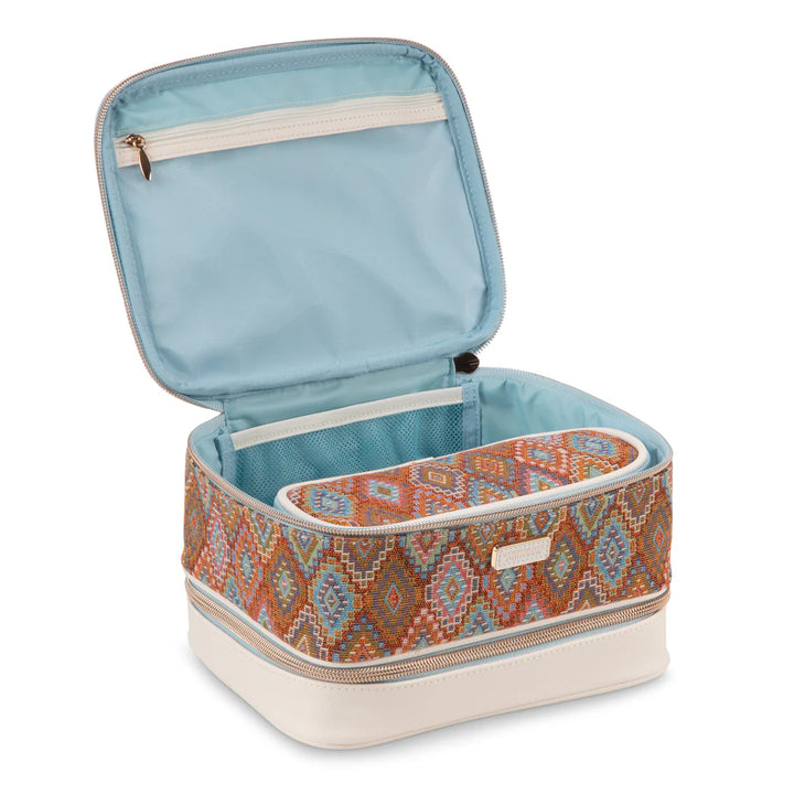 Interior detail view: Stephanie Johnson Jenny Train Case shown open, highlighting clear plastic-lined interior, mesh zip pocket in lid, and removable Bodrum Kilim pouch nested inside top compartment.