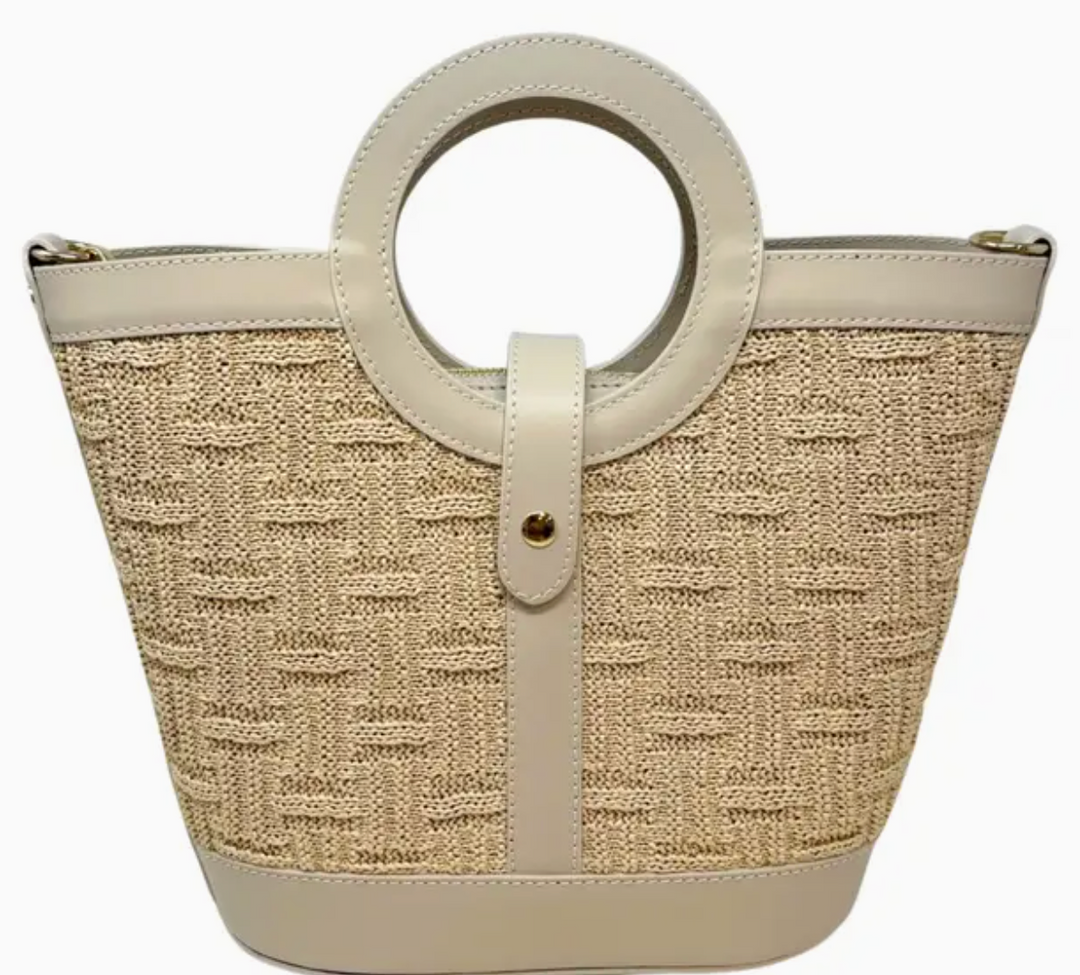 Beige woven handbag with circular handles on a white background