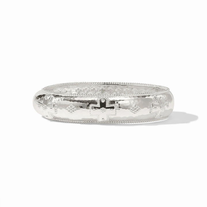 Julie Vos Canterbury Hinge Bangle in silver plate — wide hammered band with cross motif and milgrain detail, shown standing upright on white background.
