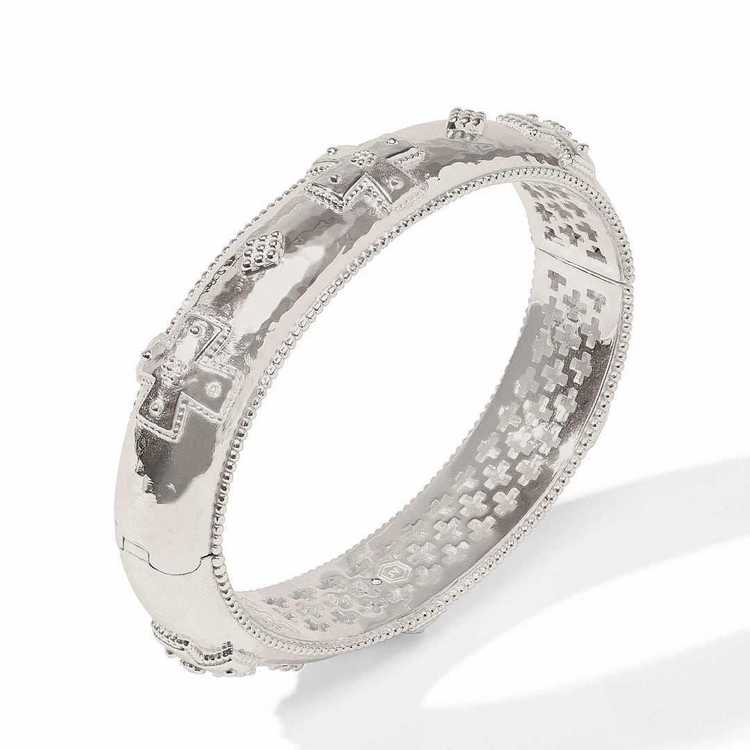 Julie Vos Canterbury Hinge Bangle in silver plate — wide hammered band with cross motif and milgrain detail, shown standing upright on white background.