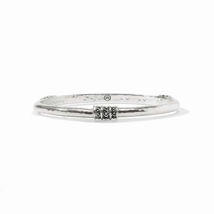 Julie Vos Catalina Bangle in silver plate, shown on wrist — slim hammered band with bead-in-diamond detail.