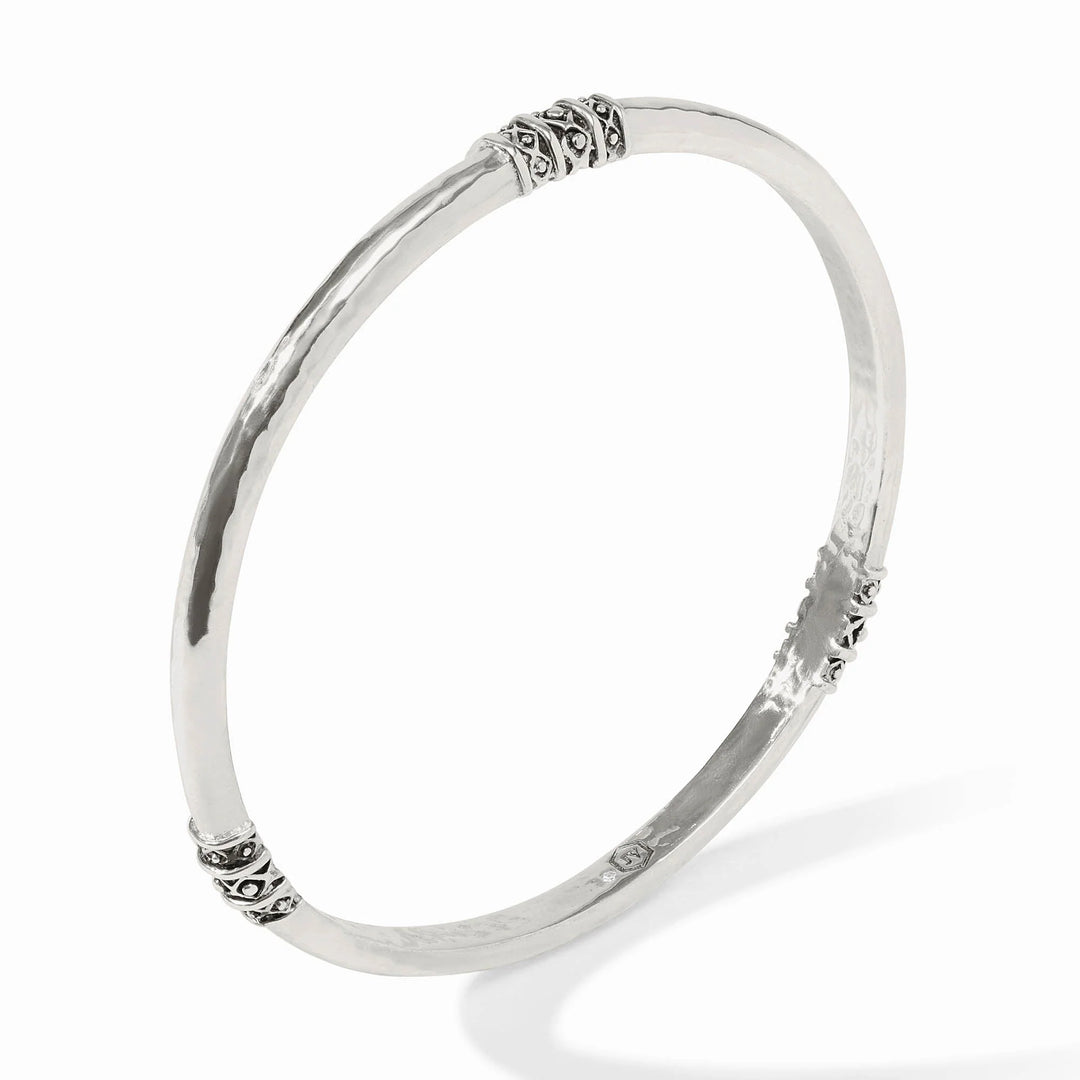 Julie Vos Catalina Bangle in silver plate, shown on wrist — slim hammered band with bead-in-diamond detail.