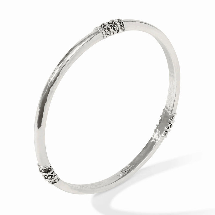 Julie Vos Catalina Bangle in silver plate, shown on wrist — slim hammered band with bead-in-diamond detail.