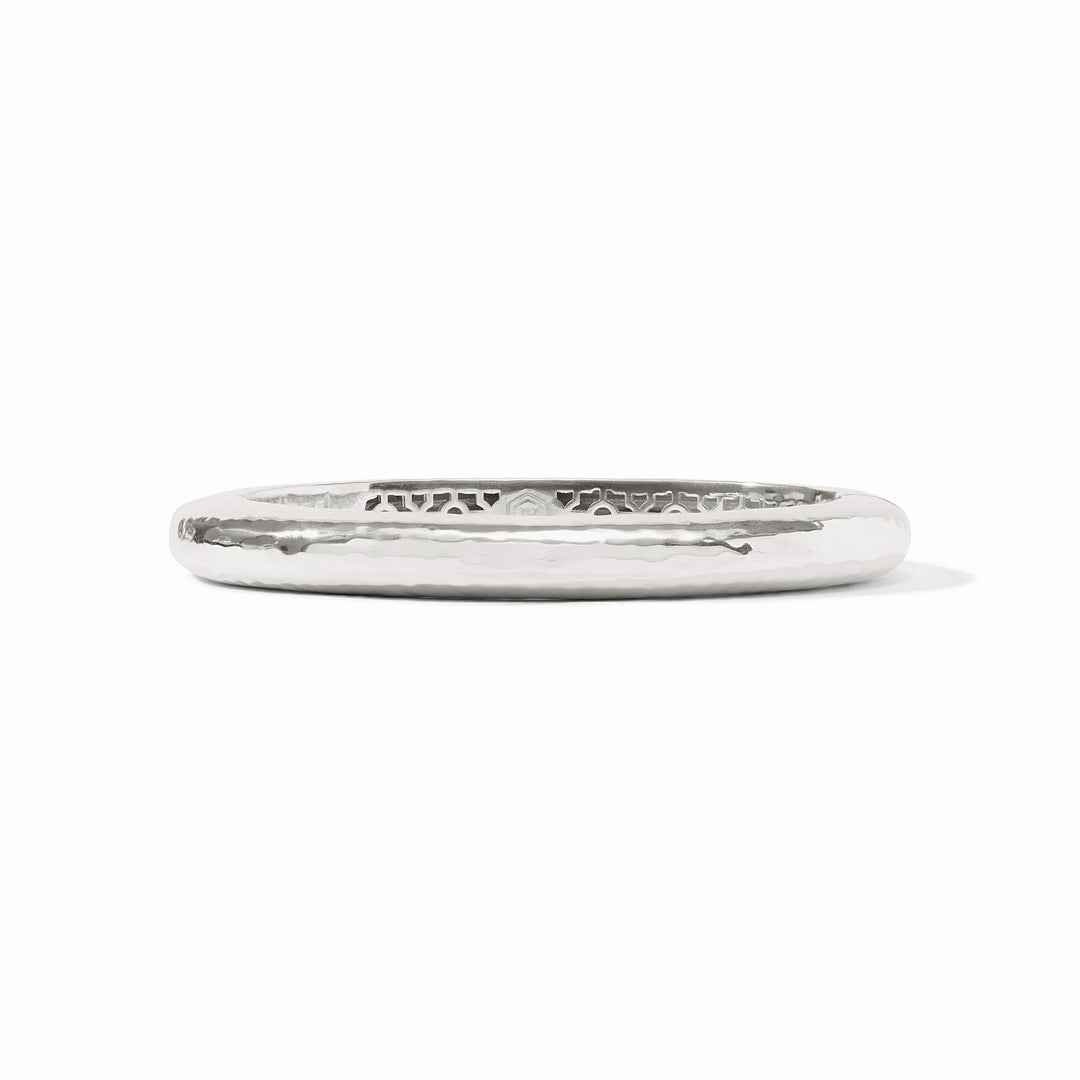 Julie Vos Catalina Hinge Bangle in silver plate — smooth hammered oval band with engraved interior detailing and Julie Vos hallmark, shown standing upright on white background.