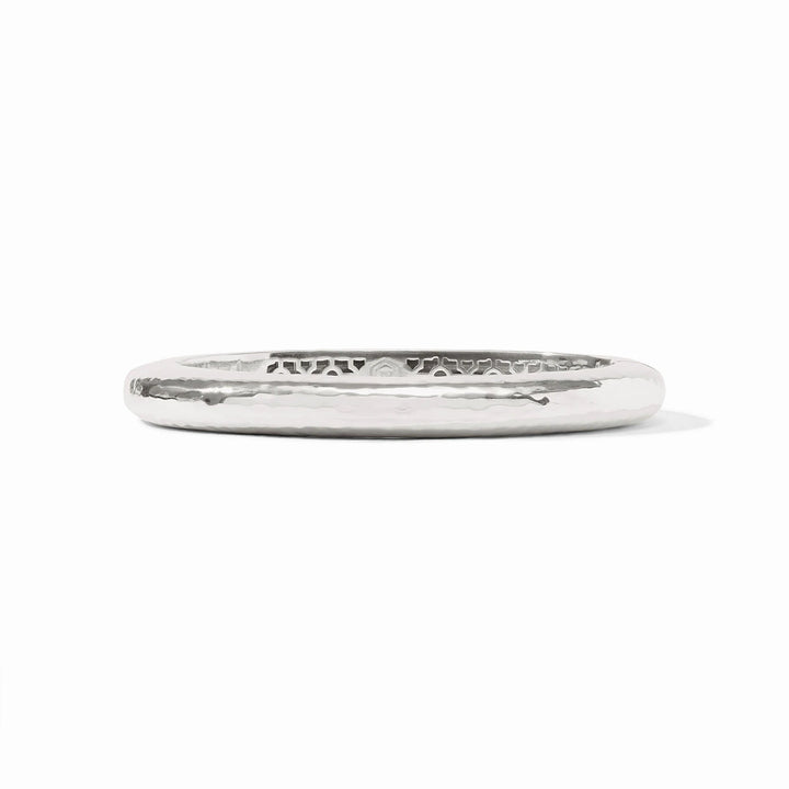 Julie Vos Catalina Hinge Bangle in silver plate — smooth hammered oval band with engraved interior detailing and Julie Vos hallmark, shown standing upright on white background.