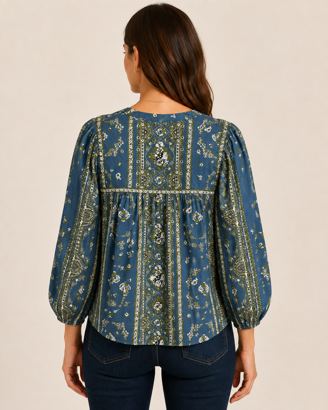 Cleobella Imogen Top in Fioren Print, back view, showing yoke seam, gathered fullness, and blouson sleeve.