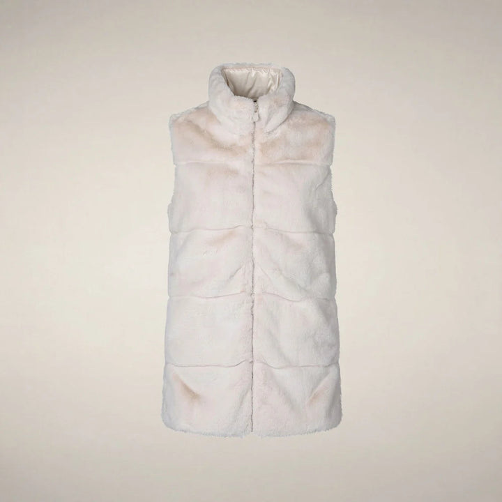 Front view of the Nives vest laid flat, showing the faux fur side with stand-up collar and central zipper.