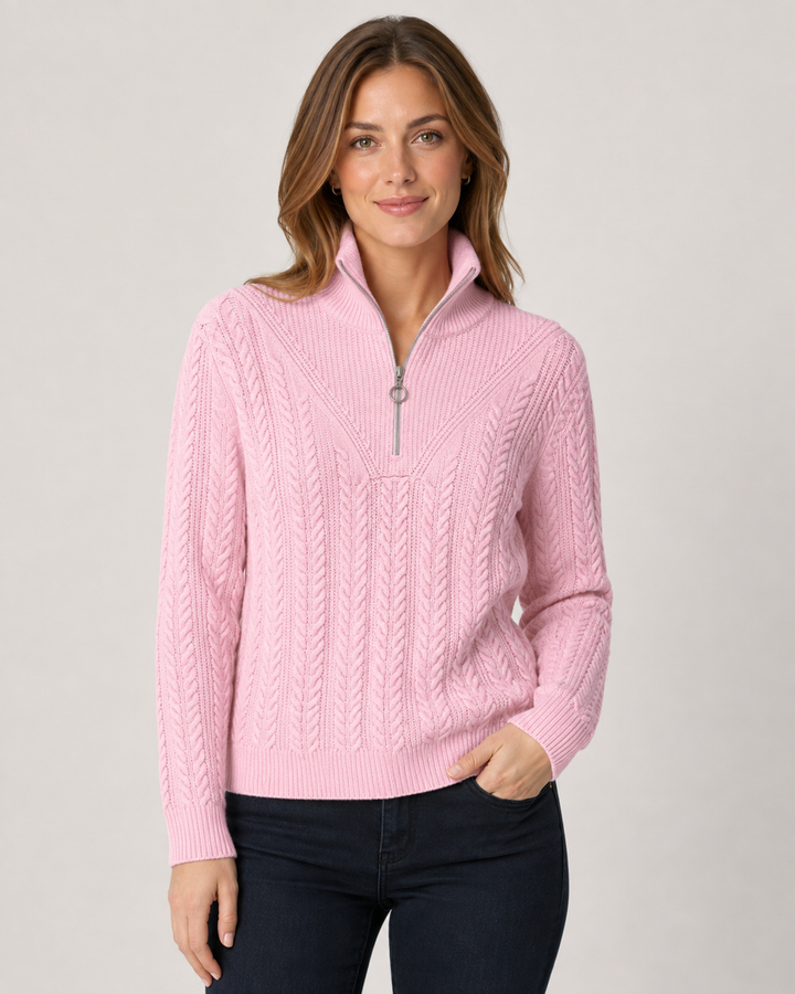 Elliott Lauren Cable Sweater in Pink, front view, model wearing pink cable-knit quarter-zip sweater with dark denim.