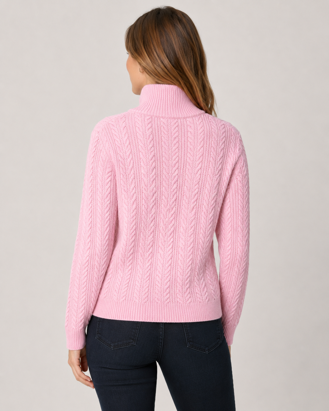 Elliott Lauren Cable Sweater in Pink, back view, showing raglan sleeve seaming and ribbed hem.