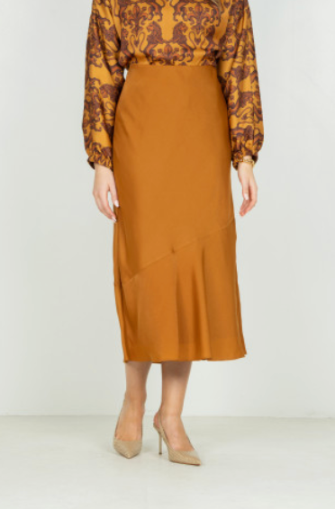 Emily McCarthy Bias Midi Skirt Pecan – front view on model, cropped at shoulders, showing bias hem and waistband