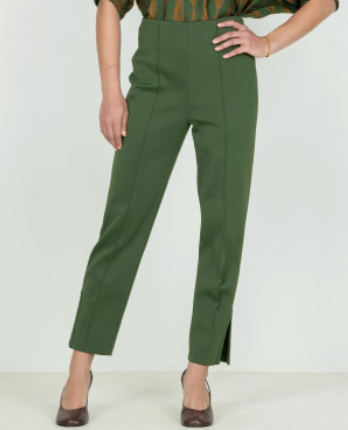 Emily McCarthy Slim Pant Black Forest – closer front view on model, showing pin-tuck detail and ankle slit