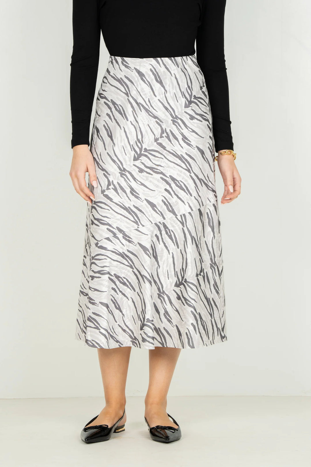 Emily McCarthy Bias Midi Skirt in Wild Marble — front detail view showing bias seaming and print placement