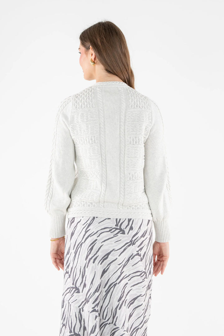 Emily McCarthy Chloe Cardigan in Carrara — back view showing cable-knit detailing and silhouette