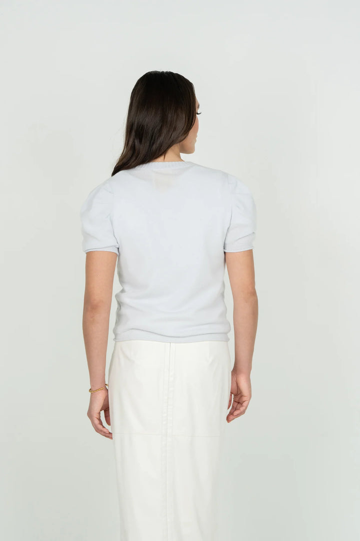 Emily McCarthy Barely Blue Crewneck Knit Sweater — back view showing ribbed neckline and hem