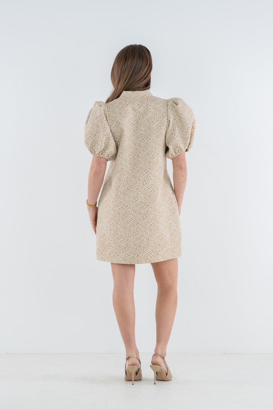 Emily McCarthy Hampton Mini Dress in Mosaic Monogram — back view showing silhouette and puff sleeve shape