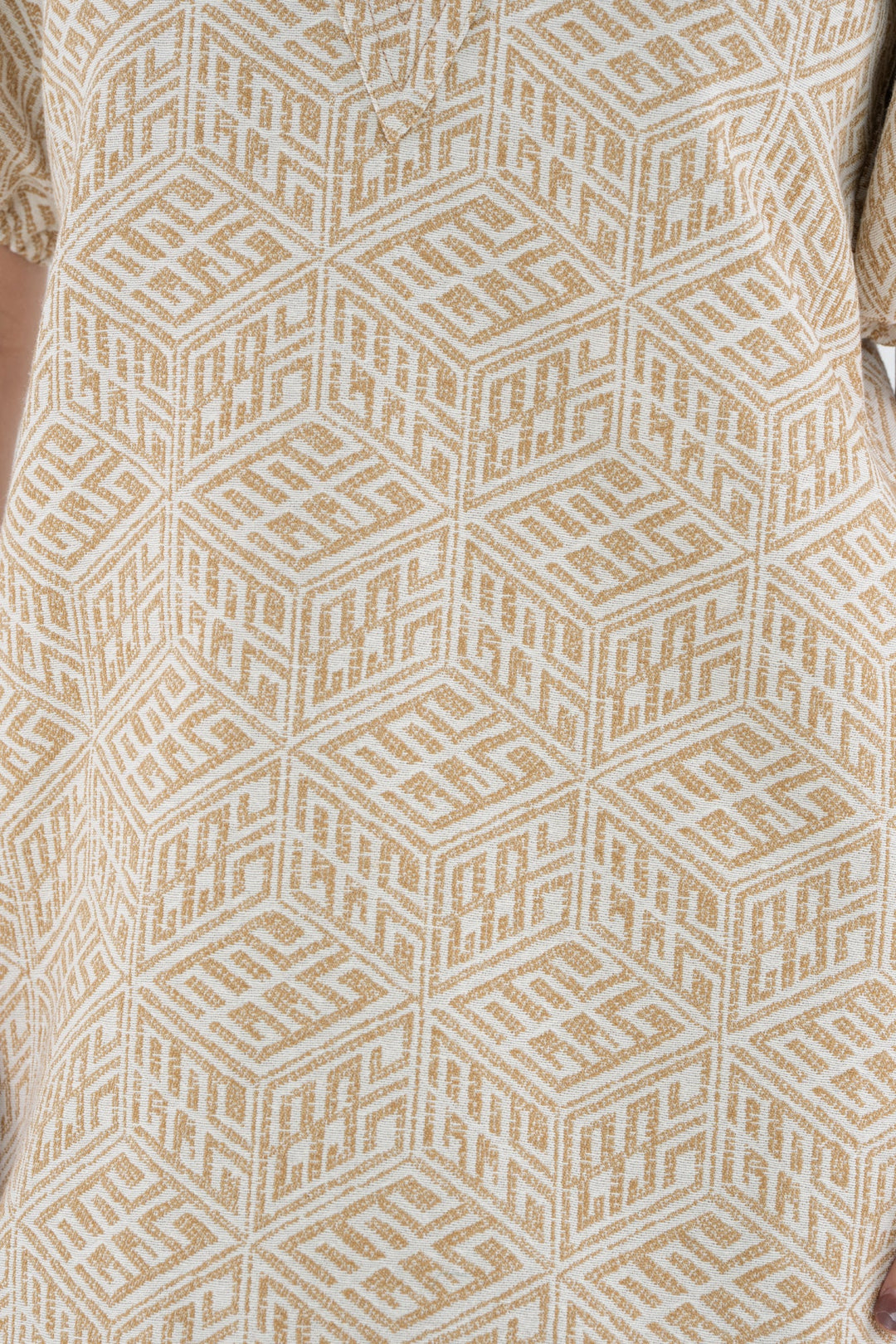 Emily McCarthy Hampton Mini Dress in Mosaic Monogram — close-up detail of tan/camel and ivory jacquard mosaic monogram print