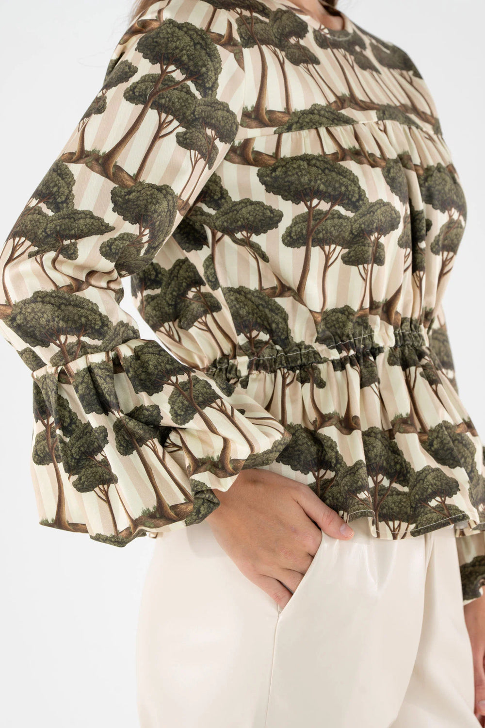 Close-up of the Umbrella Pine print fabric and bubble-hem sleeve detail on the Harper Top.