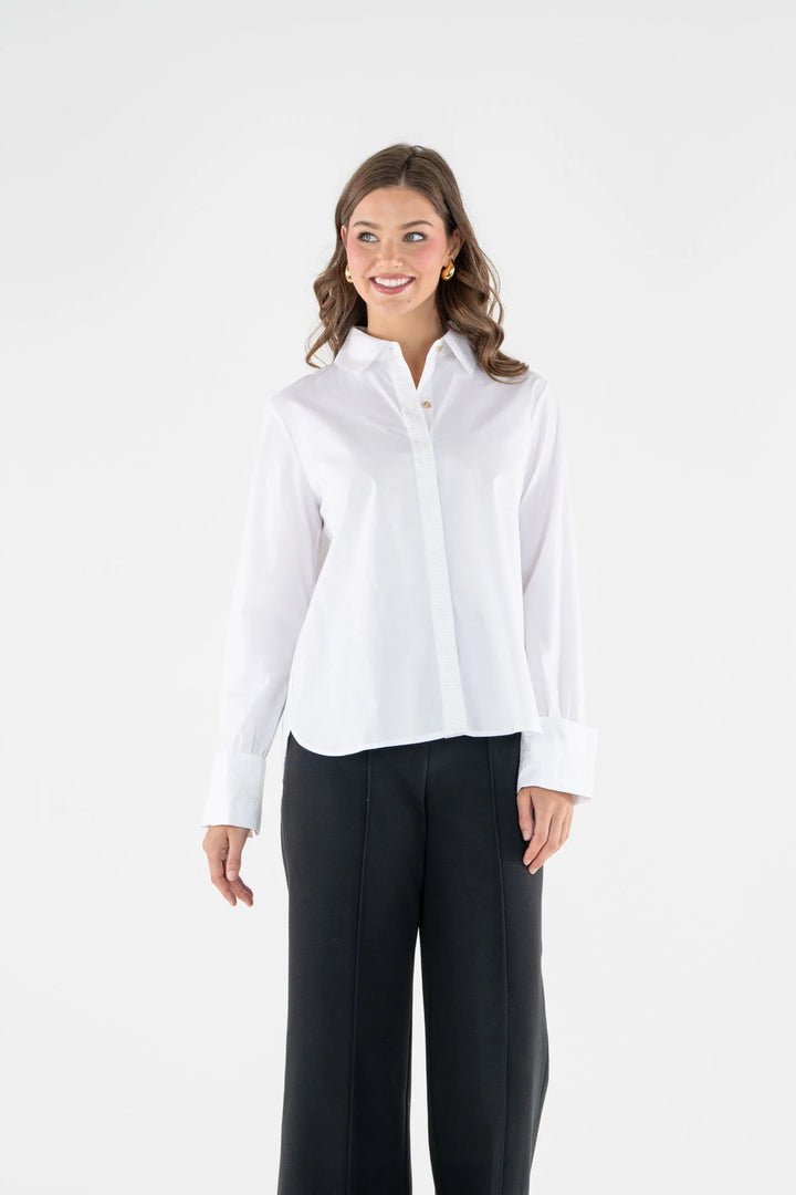 Emily McCarthy Classic Oxford Top in White — front on-model, styled with black wide-leg cropped trousers