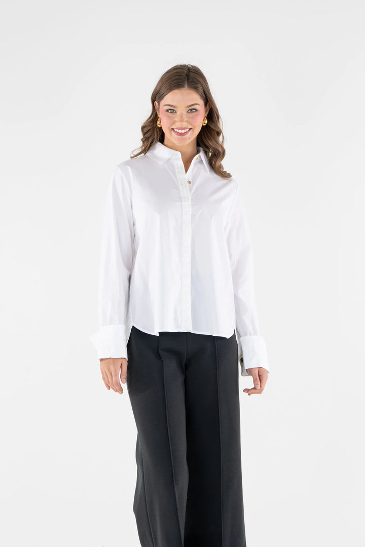 Emily McCarthy Classic Oxford Top in White — front on-model, styled with black wide-leg cropped trousers 3