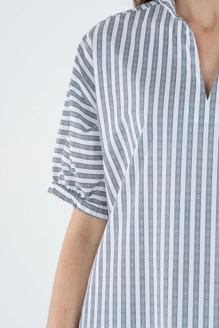 Emily McCarthy Poppy Maxi Dress in Black Stripe — detail close-up of collar, sleeve, and monogram stripe pattern
