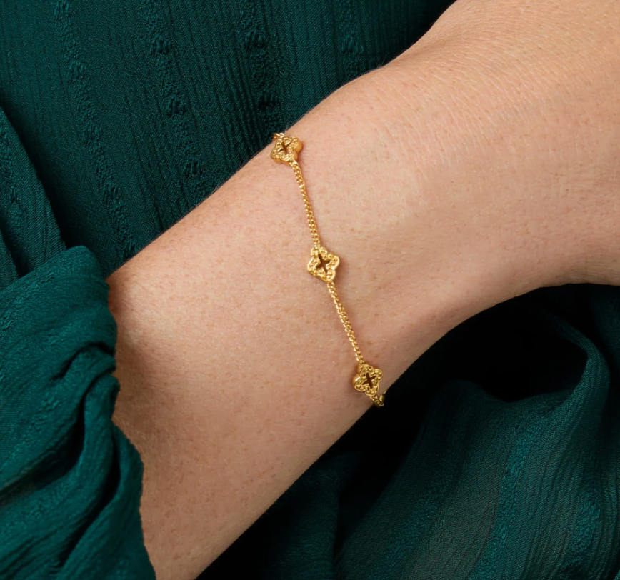 Julie Vos Florentine Delicate Bracelet, on-model wrist detail showing quatrefoil stations