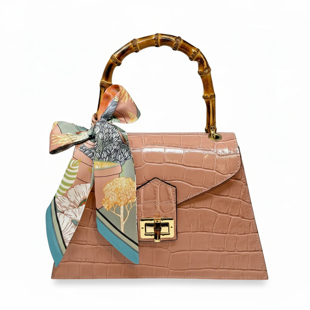 Italian Crocco Leather Bamboo Handle Bag with structured silhouette and front flap closure Nude