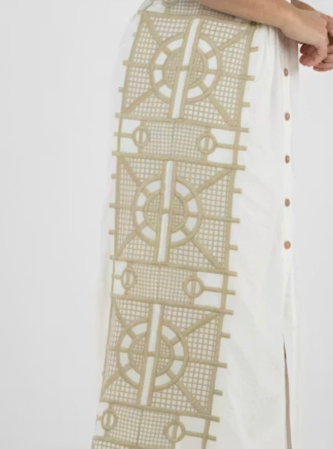 Emily McCarthy Georgia Dress in Trellis ivory cotton with geometric taupe embroidery panel and open V-collar - Closeup