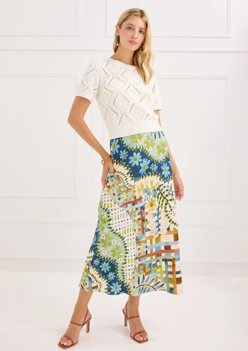 Alivia The Nora Ivory Floral Embroidery Sweater styled with the Hillary Skirt in Mosaic Meadow, full-length on-model