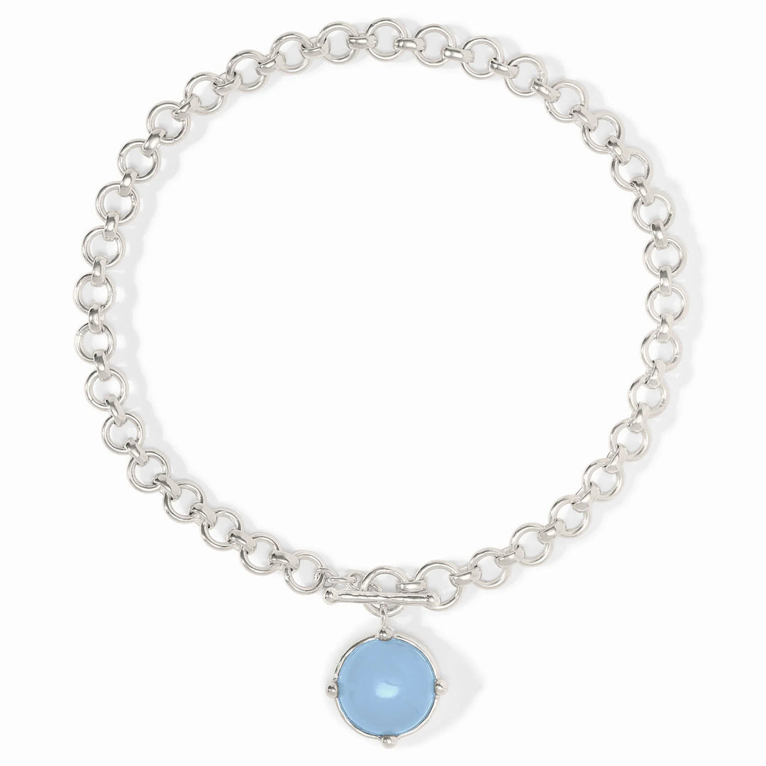 Julie Vos Honeybee Demi Necklace in silver plate — chunky round-link chain with toggle closure and round blue glass pendant in four-prong setting, stone face shown, on white background.