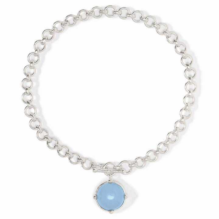 Julie Vos Honeybee Demi Necklace in silver plate — chunky round-link chain with toggle closure and round blue glass pendant in four-prong setting, stone face shown, on white background.