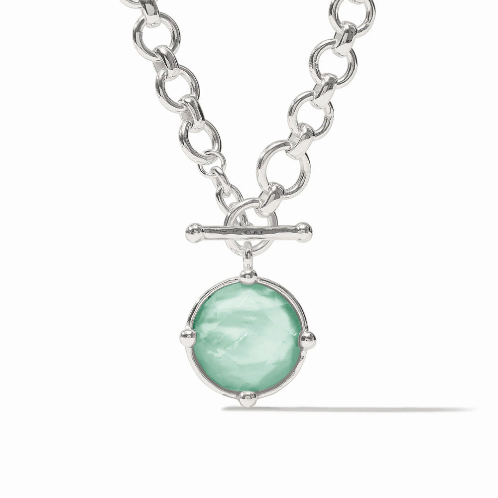 Julie Vos Honeybee Demi Necklace in silver plate — chunky round-link chain with toggle closure and round iridescent aquamarine blue glass pendant in four-prong setting, stone face shown, on white background.