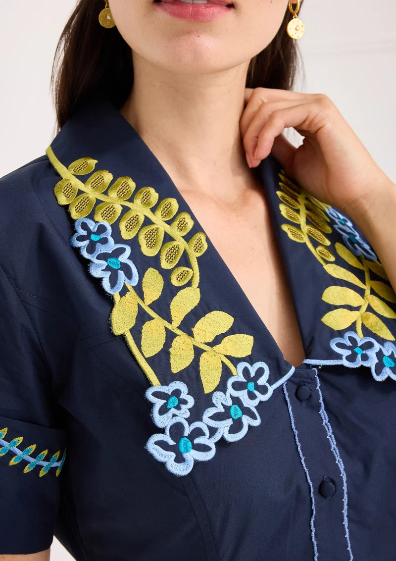 Alivia The Julia Navy Floral Embroidery Dress, close-up detail of collar embroidery and button placket