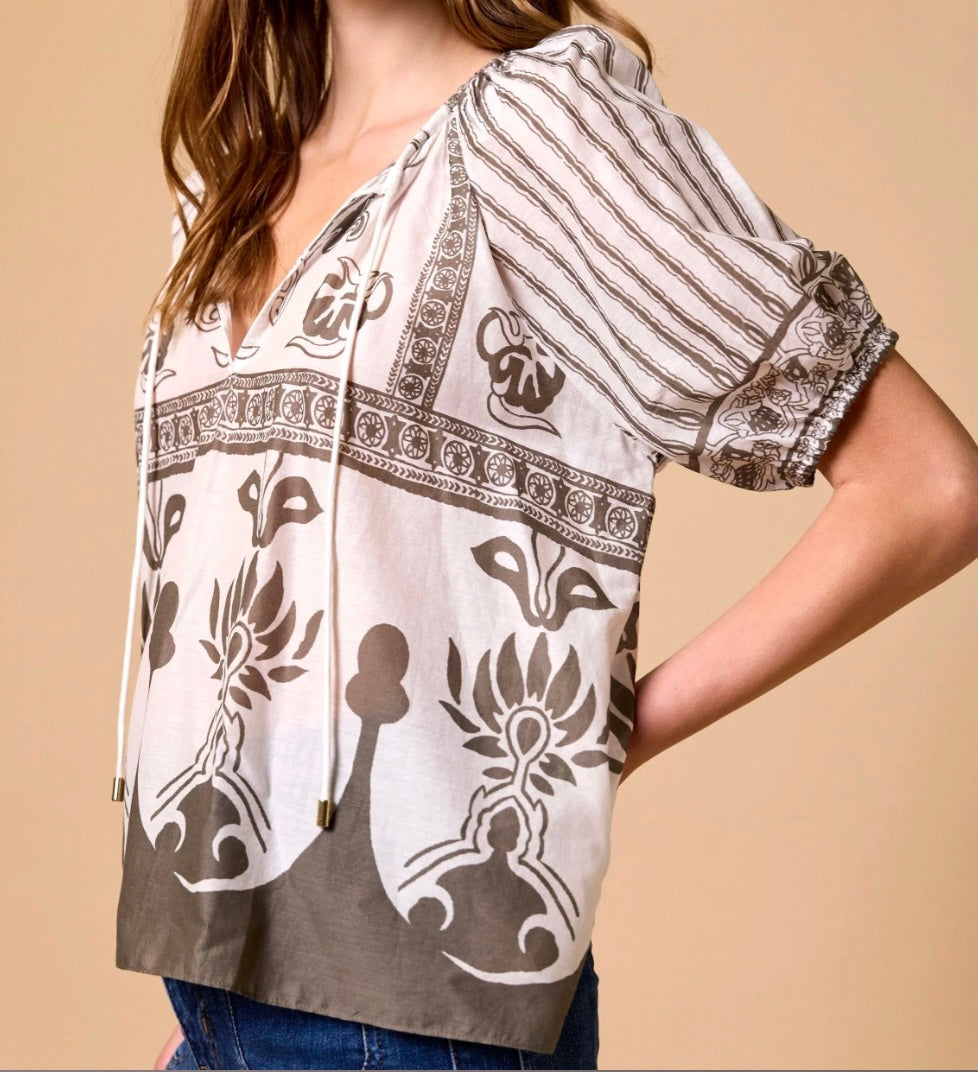 Cleobella Johana Blouse in sable, relaxed V-neck border-print top with tassel tie and elasticated raglan sleeves