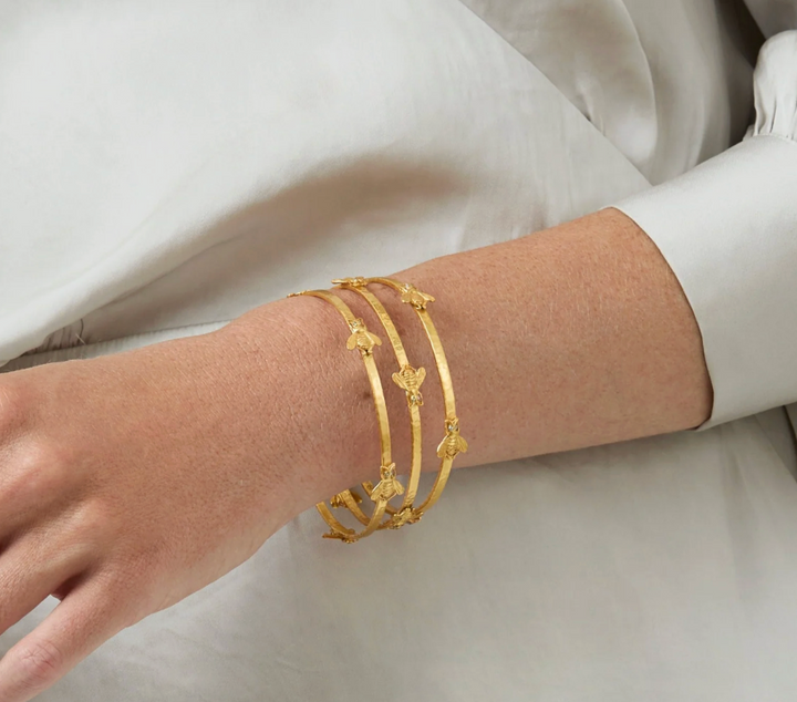 Julie Vos Bee Bangle, on-model detail worn in a stack of three, wrist close-up